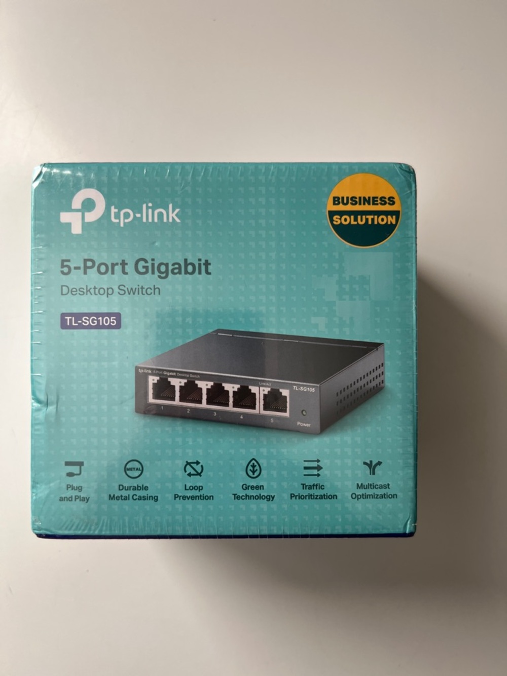 TP-Link 5-Port Gigabit Desktop Switch in Teal Box with Black Switch
